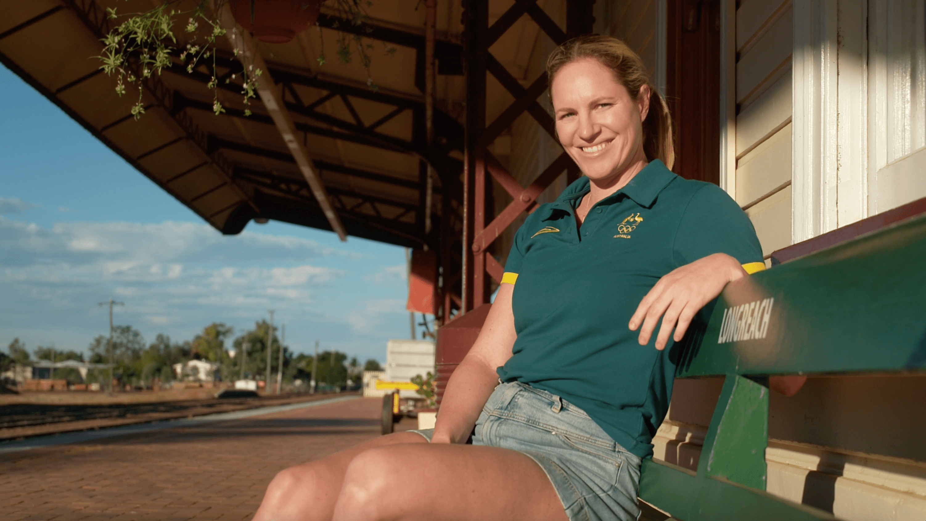 Emily Seebohm sitting at the Longreach train station