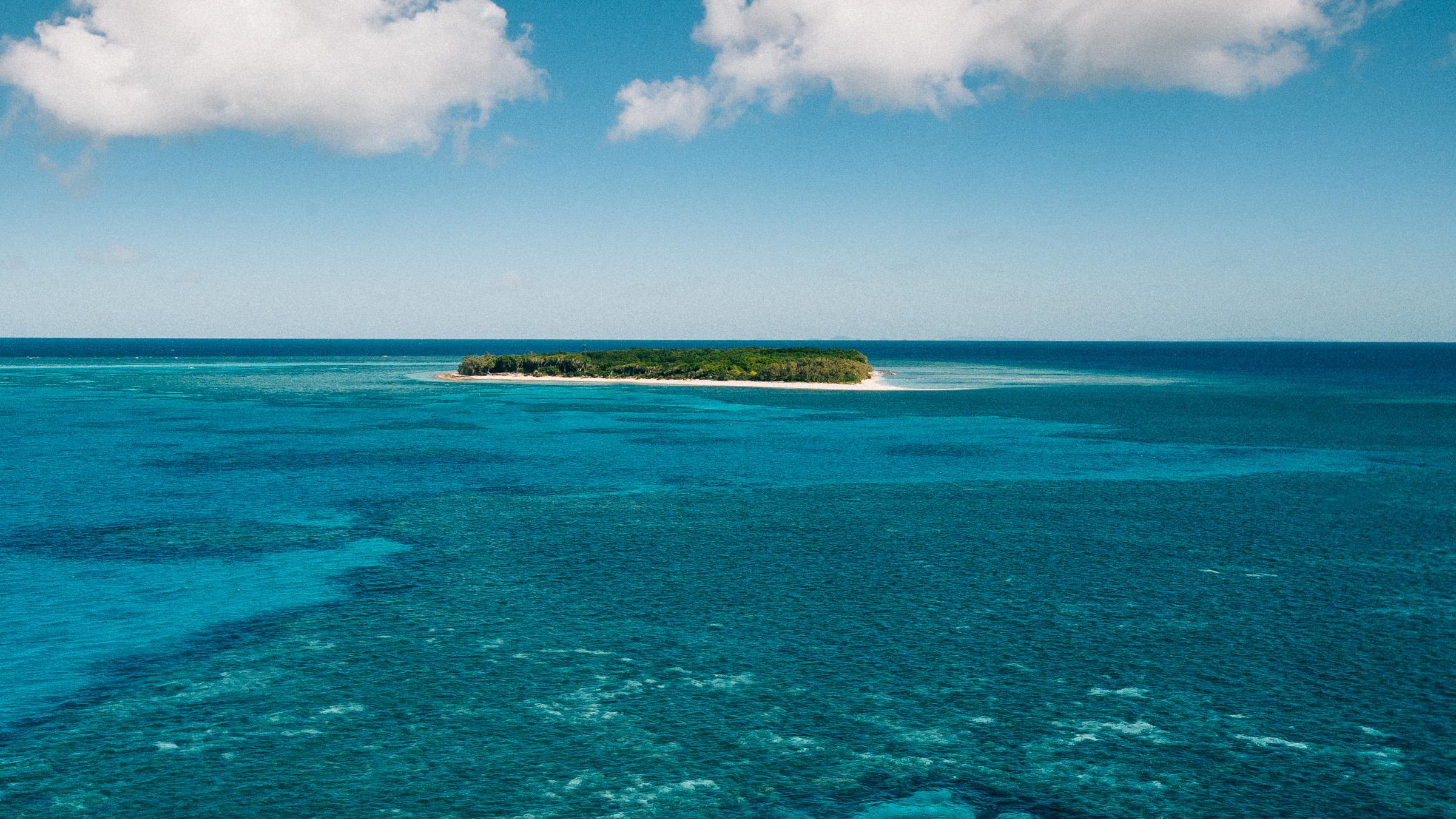 Lady Musgrave Island surrounded by the bright blue waters of the Great Barrier Reef