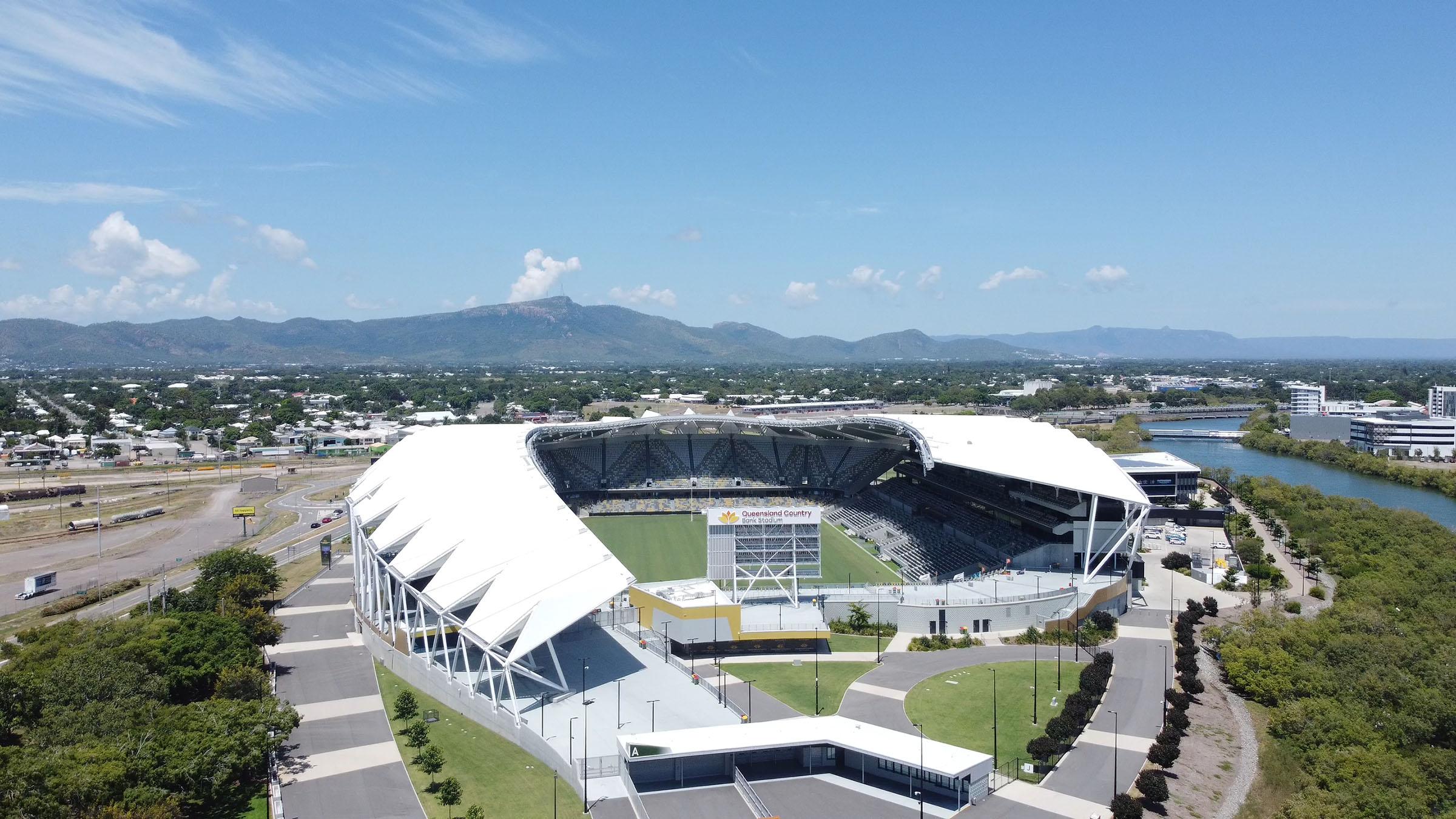 Aerial view of Queensland Country Bank Stadium next to river